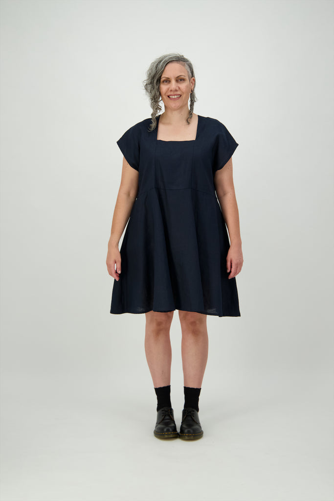 Women wears navy linen dress with flared skirt Citizen Women
