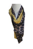Animal print scarf with mustard lining loosely wrapped around mannequineneck