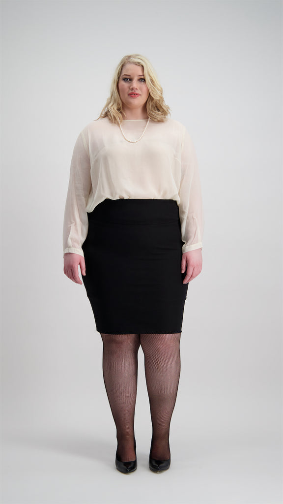 Woman wears boat neck top with pearls and black pencil skirt, fishnet stockings and high heels Citizen Women 