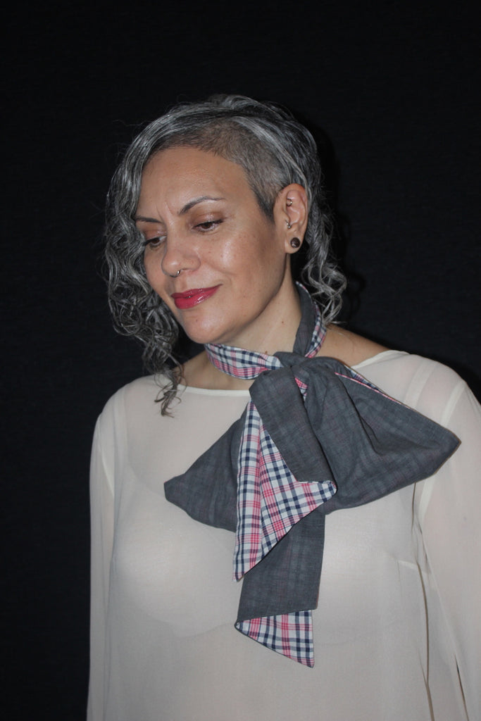 Women wearing soft grey scarf with cheeky check lining, tied in a bow at neck, Citizen Women