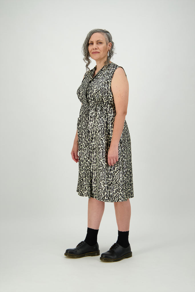 Woman wearing revere neckline button through dress with shirred waistline Citizen Women 