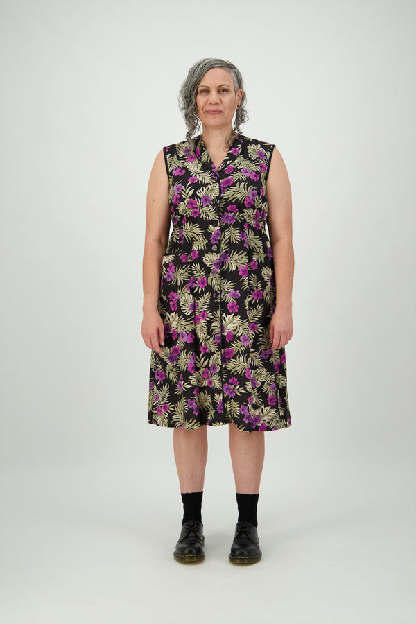 Woman wears floral linen button though shirred waist dress Citizen Women