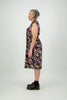 Side view, woman wears floral dress with contrast binding on armhole Citizen Women