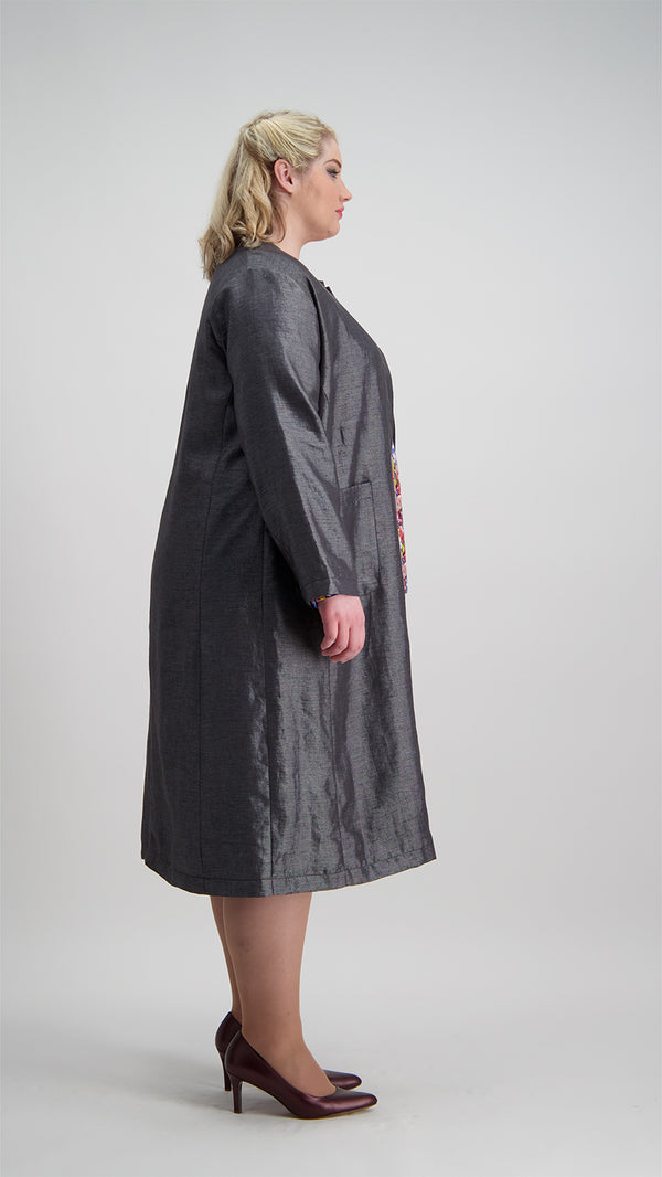 Side view of woman wearing a long sleeve 100% linen coat, Citizen Women