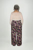 Back view woman wearing elastic waist floral linen trousers, Citizen Women